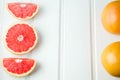 Fresh grapefruit on white boards, food wooden background, orange, citrus, frui, place for text