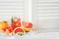 Fresh grapefruits, fitness accessories. Royalty Free Stock Photo