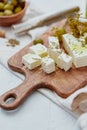 Fresh Greek Feta Cheese with olives. Healthy ingredient for cooking salad Royalty Free Stock Photo