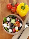 Fresh greek salad in clay bowl Royalty Free Stock Photo