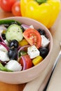 Fresh greek salad in clay bowl Royalty Free Stock Photo