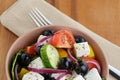 Fresh greek salad in clay bowl Royalty Free Stock Photo