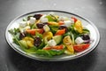 Fresh Greek salad with cucumber, cherry tomato, lettuce, red onion, feta cheese and black olives. Healthy food Royalty Free Stock Photo