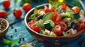 Fresh greek salad with tomato, cucumber, bel pepper , olives and feta cheese on black plate Royalty Free Stock Photo