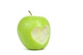 Fresh green apple with cut off heart shape. Royalty Free Stock Photo