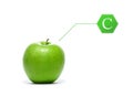 A fresh green apple with a vitamin C letter Royalty Free Stock Photo