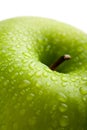 Fresh green apple with water droplets isolated Royalty Free Stock Photo