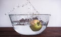 Fresh green apple in water Royalty Free Stock Photo