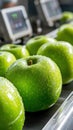 Fresh green apples on conveyor belt in modern fruit processing factory Royalty Free Stock Photo