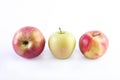 Fresh green apples on a white background. The Three green apples on a white background. Royalty Free Stock Photo