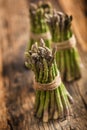 Fresh green asparagus on old oak table Royalty Free Stock Photo