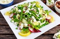 Fresh Green Asparagus salad witch Goat Cheese, peas, radishe, zucchini, lettuce and Hazelnuts. Royalty Free Stock Photo