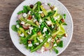 Fresh Green Asparagus salad witch Goat Cheese, peas, radishe, zucchini, lettuce and Hazelnuts. Royalty Free Stock Photo