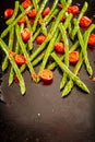 Fresh green asparagus spears with roasted tomatoes Royalty Free Stock Photo