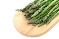 Fresh green asparagus on a wooden cutting board. Royalty Free Stock Photo