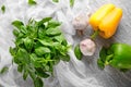 Fresh green basil with vegetables on table Royalty Free Stock Photo