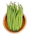 Fresh green beans in a wooden bowl, young, unripe fruits of the common bean