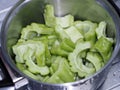 Fresh green bitter melon or bitter gourd sliced ready to cook Royalty Free Stock Photo