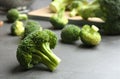 Fresh green broccoli florets on grey table. Space for text Royalty Free Stock Photo