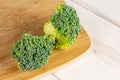 Fresh green broccoli on grey wood Royalty Free Stock Photo