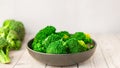 Fresh green broccoli on a light background. Macro photo green fresh vegetable broccoli