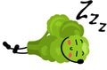 Fresh green broccolis funny mascot sleeping Royalty Free Stock Photo