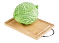 Fresh green cabbage head on wooden chopping board Royalty Free Stock Photo