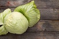 Fresh green cabbage on a wooden table