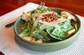 fresh green caesar salad with bacon and cheese on top Royalty Free Stock Photo