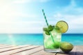 fresh green cocktail on tropical beach AI generated Royalty Free Stock Photo