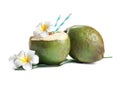 Fresh green coconuts with drinking straws