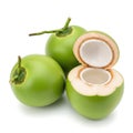 Fresh green coconuts with one cut open to reveal the white interior Royalty Free Stock Photo