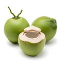 Fresh green coconuts with one opened to reveal the white interior and clear liquid Royalty Free Stock Photo
