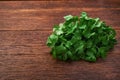 Fresh green cilantro, coriander leaves on wooden background Royalty Free Stock Photo