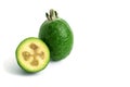 Fresh green feijoa on a white background, isolated. Tropical fruit feijoa whole and half