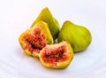 Figs on the white plate, jam cooking process. Royalty Free Stock Photo