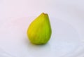 Figs on the white plate, jam cooking process. Royalty Free Stock Photo