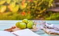 Still life with figs, jam cooking process. Notebook with copy space. Royalty Free Stock Photo