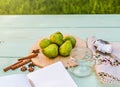 Still life with figs, jam cooking process. Notebook with copy space. Royalty Free Stock Photo