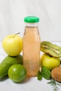 Fresh green fruit juice in a glass bottle, apple Royalty Free Stock Photo