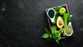 Fresh Green Fruits and Vegetables. Organic food. Rustic style. Top view. Royalty Free Stock Photo