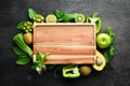 Fresh Green Fruits and Vegetables. Organic food. Rustic style. Top view. Royalty Free Stock Photo