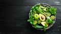 Fresh Green Fruits and Vegetables. Pure selection and source of vegetable protein on a wooden aged background. Royalty Free Stock Photo