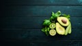 Fresh Green Fruits and Vegetables. Pure selection and source of vegetable protein on a wooden aged background. Royalty Free Stock Photo