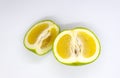 Fresh green grapefruits. Sliced fruit