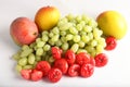 Fresh green grapes , mangoes and berrys.