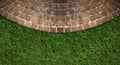Fresh green grass and stone tiles outdoors, top view. Banner design