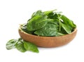 Fresh green healthy baby spinach leaves in wooden bowl Royalty Free Stock Photo