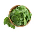 Fresh green healthy baby spinach leaves in wooden bowl isolated on white Royalty Free Stock Photo