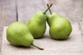 Fresh green healthy fruit pears on a wooden table